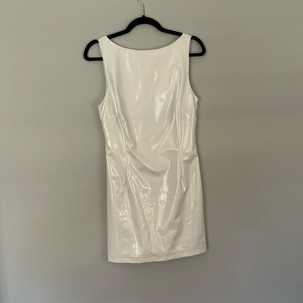 Cydnie Jordan white patent mini dress